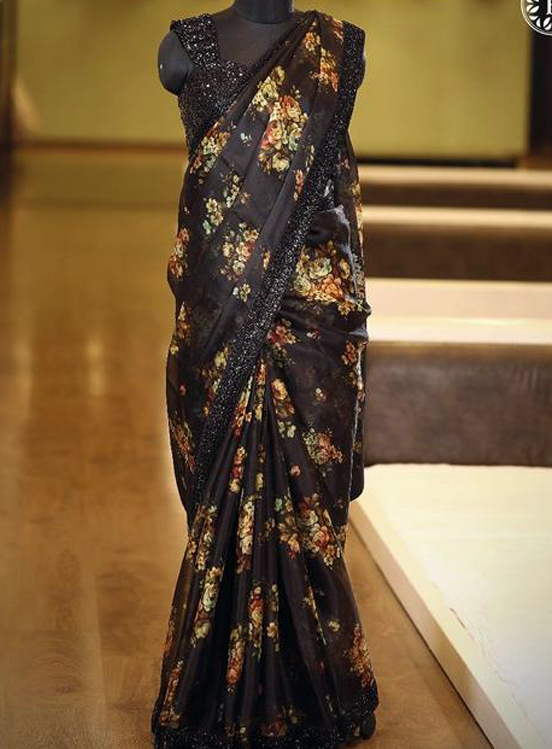 Black printed saree with heavy blouse